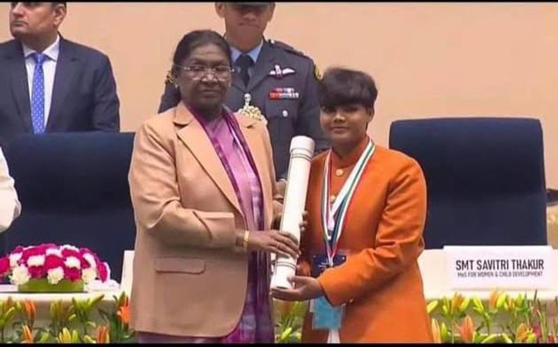 A triumph of courage: President honours JCB driver's daughter for overcoming disability